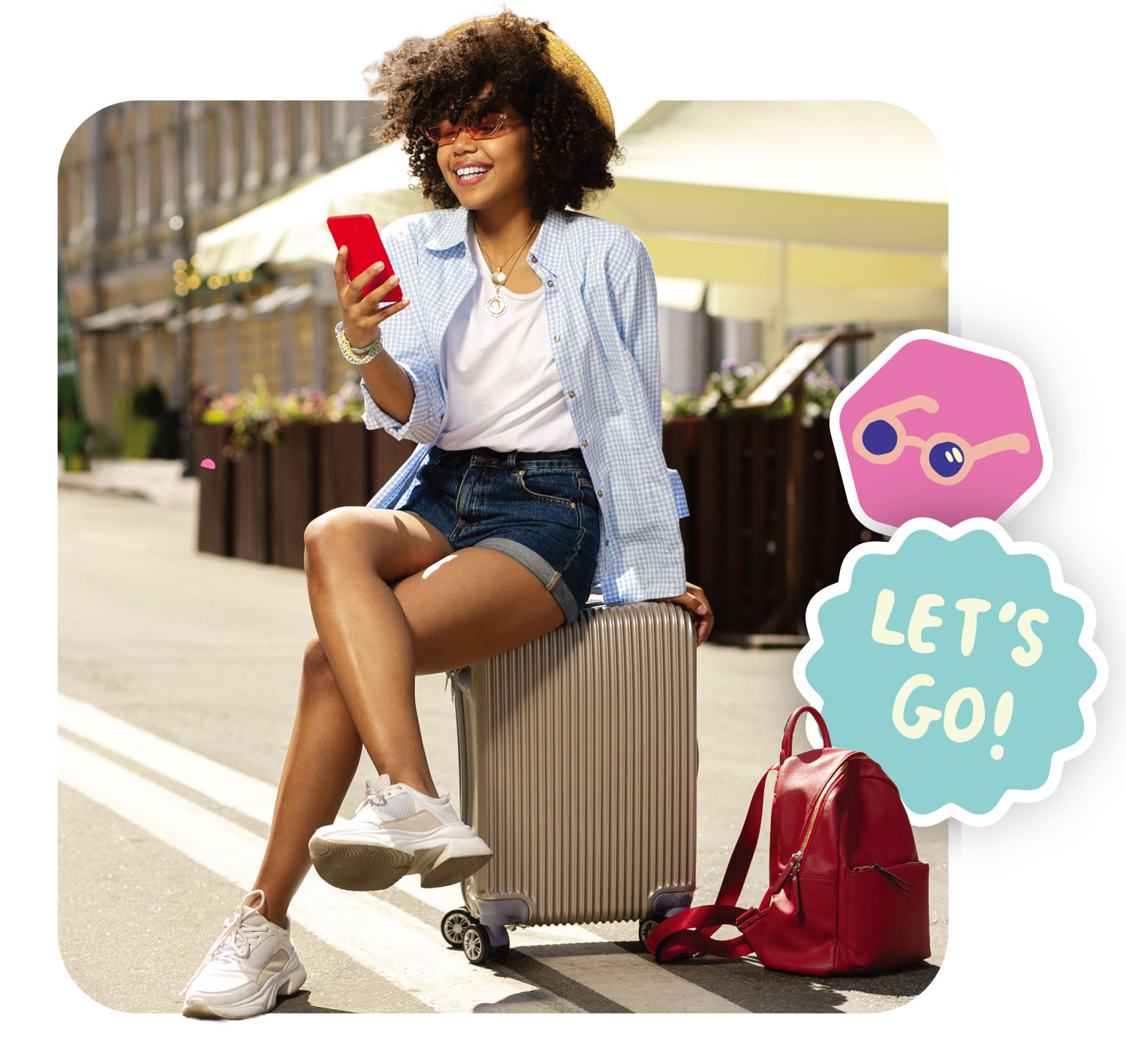 Young woman sitting on her suitcase on her mobile phone with text saying 'Let's go!'.